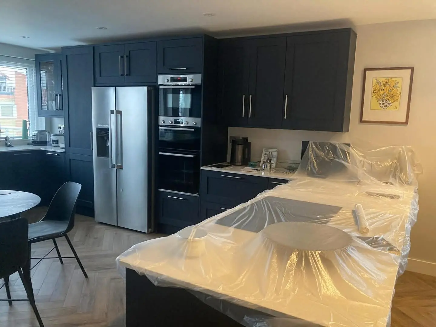 Fitted kitchen Barnet - dark blue island with quartz worktop by Resale Refurbs Ltd