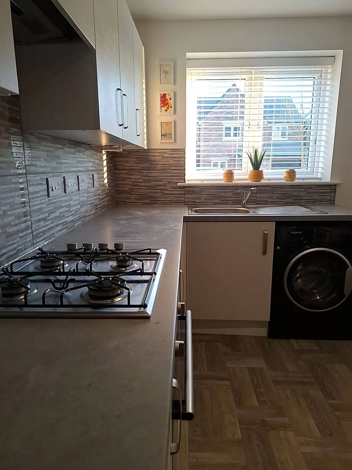 Home renovation Barnet kitchen fitted with herringbone floor and stone worktop - Resale Refurbs Ltd