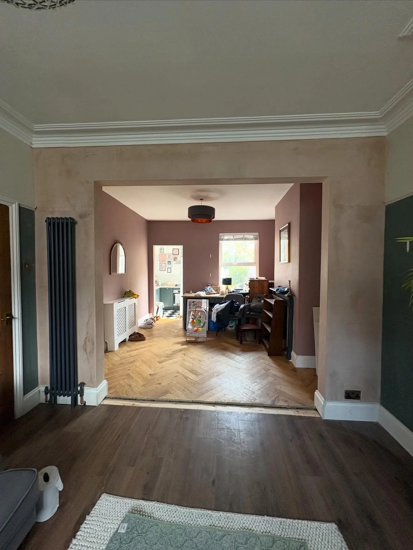 House refurbishment Barnet open plan living area after structural wall removal with herringbone floor