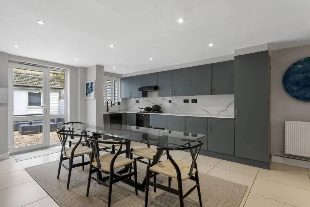Kitchen renovation Barnet London open plan dining area with grey fitted cabinets — Resale Refurbs Ltd