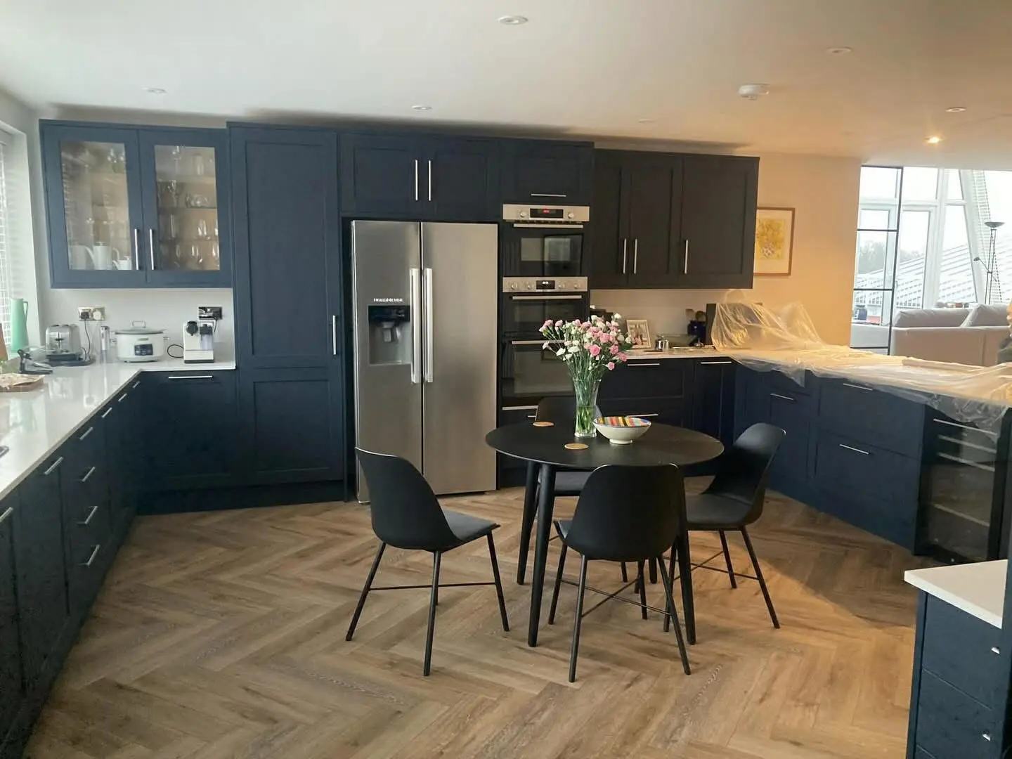 Kitchen renovation Barnet - navy shaker kitchen with herringbone floor fitted by Resale Refurbs Ltd