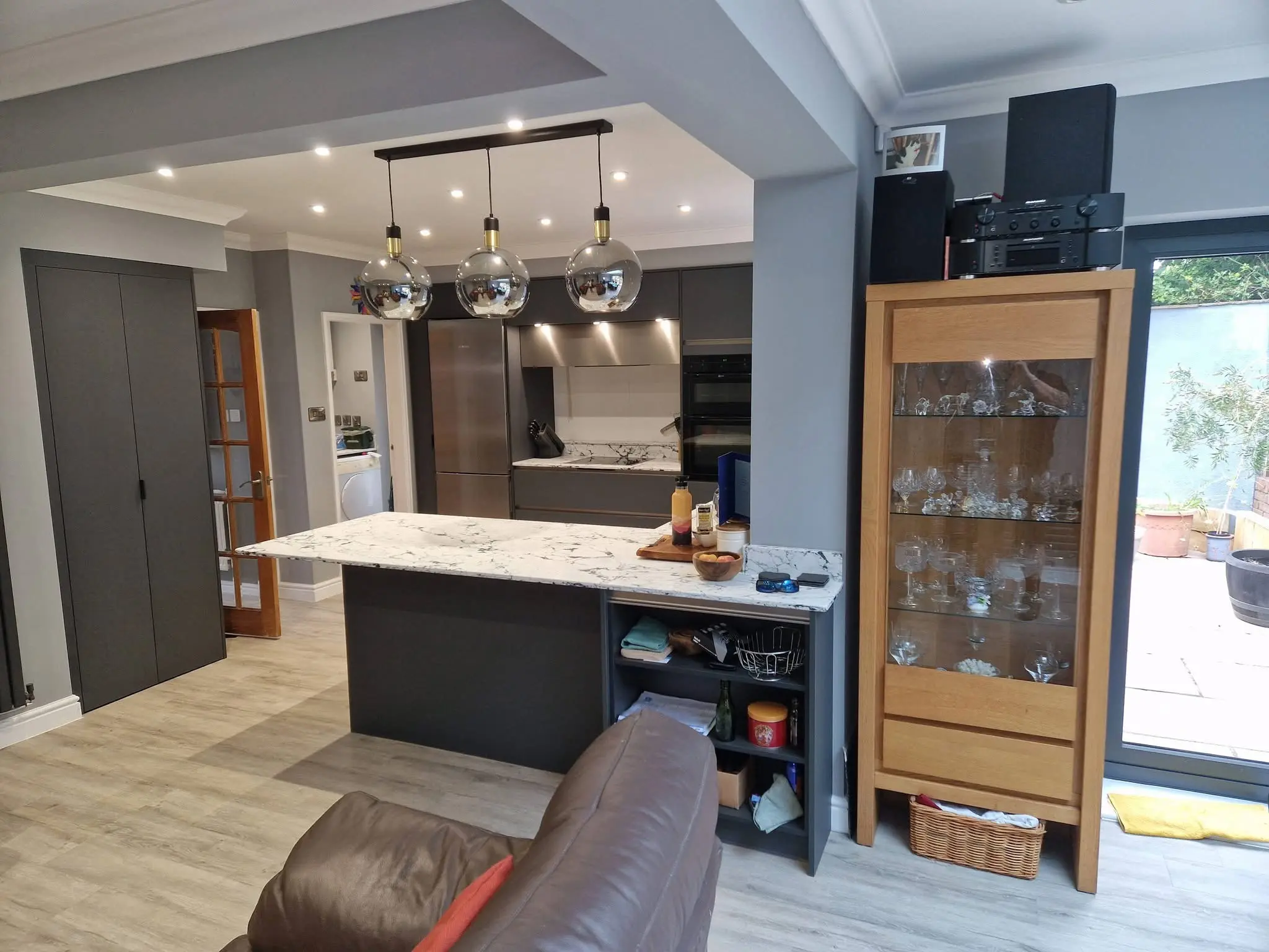 Kitchen renovation Enfield open plan kitchen with island and bifold doors to garden - Resale Refurbs Ltd