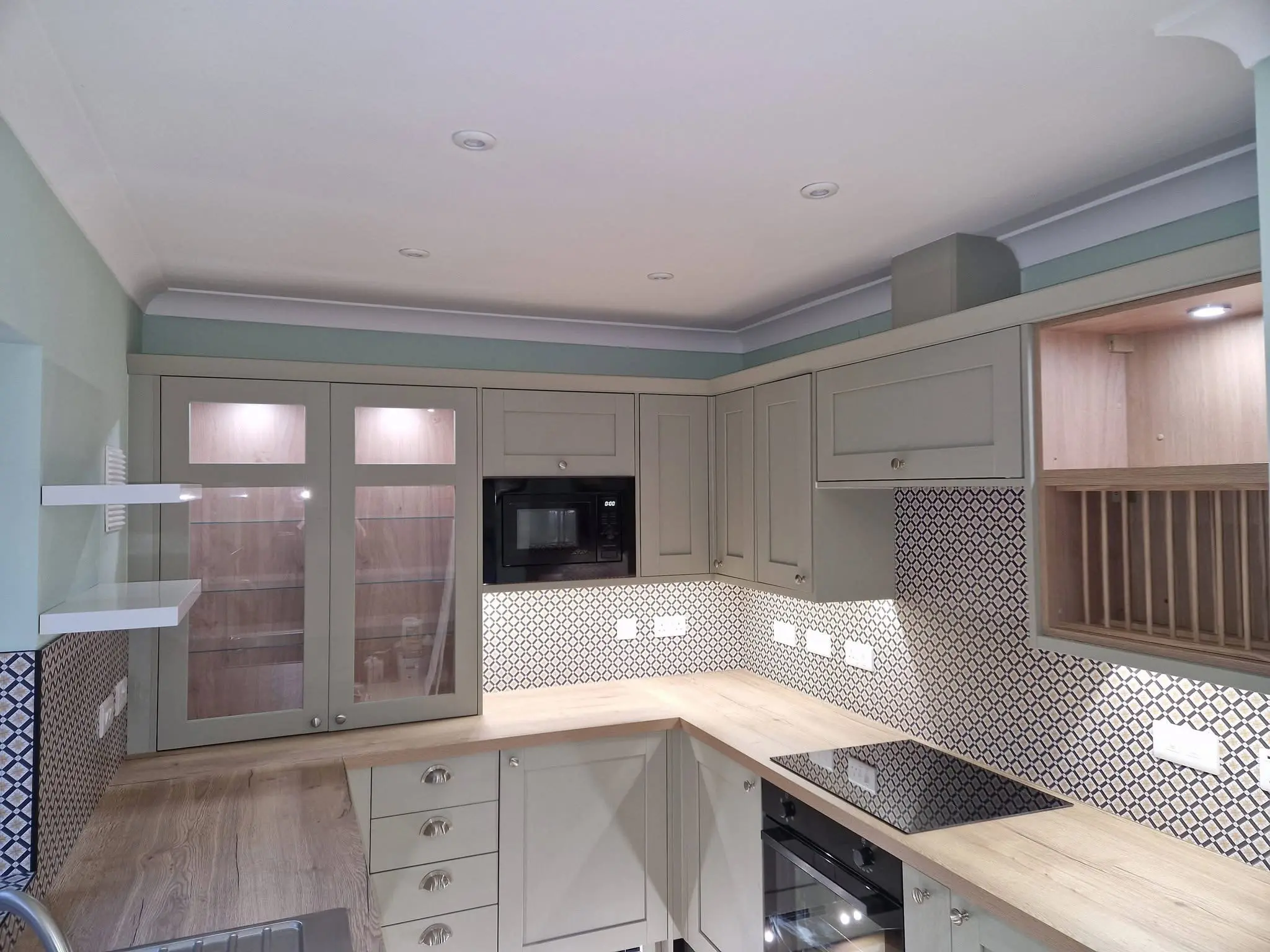 Kitchen renovation Enfield sage shaker kitchen alternate angle showing full fitted layout - Resale Refurbs Ltd